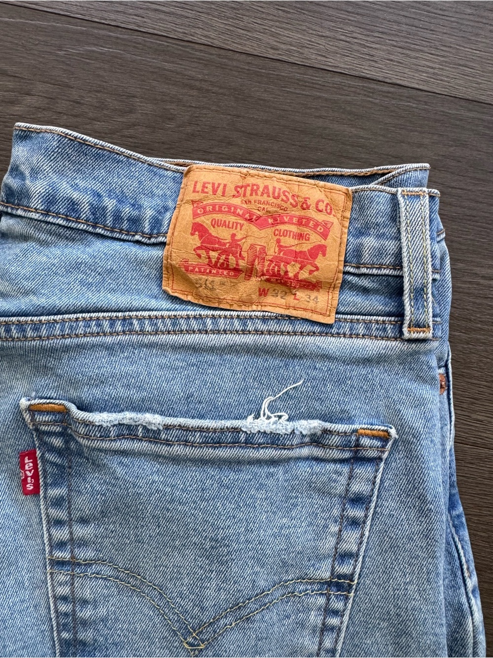 Levi's Light Blue Denim Jeans with Tan Leather Patch